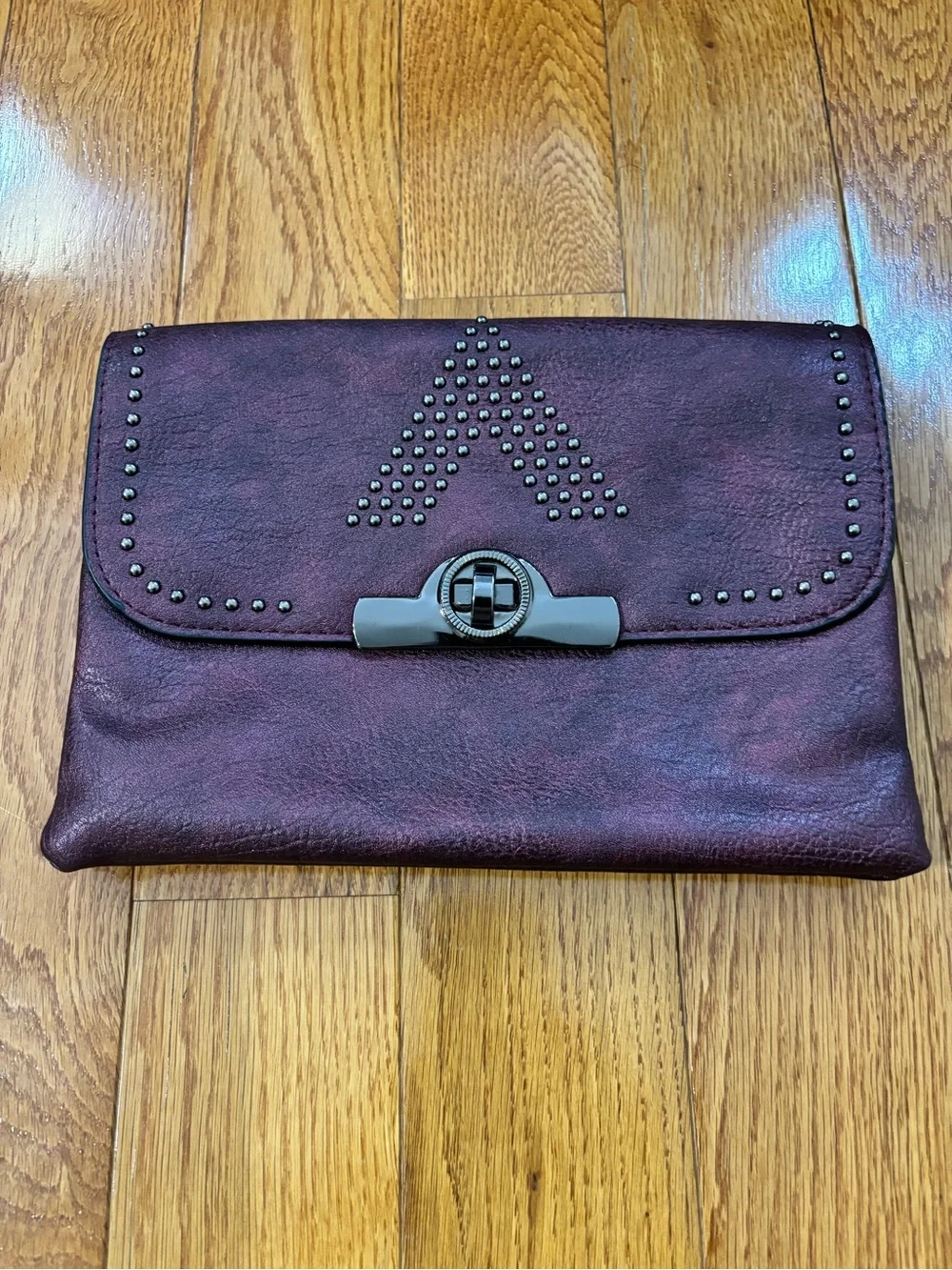 Studded Plum Leather Clutch with Turn-Lock Closure